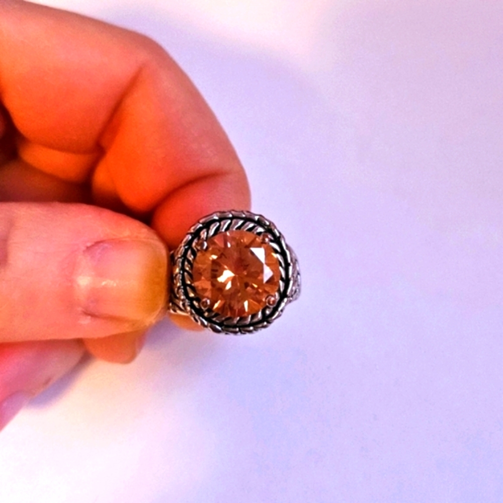 Silver and champagne ring